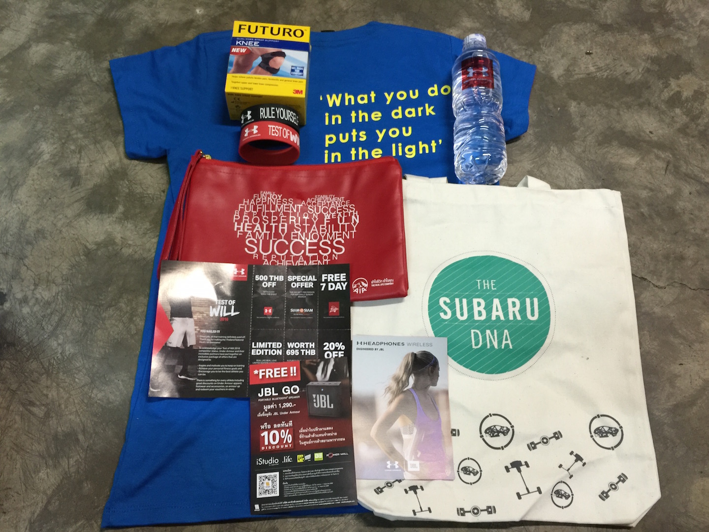 T-shirts, wrist band discount coupon JBL & Under Armour, Futuro knee supporter, AIA bag, & Subaru bag